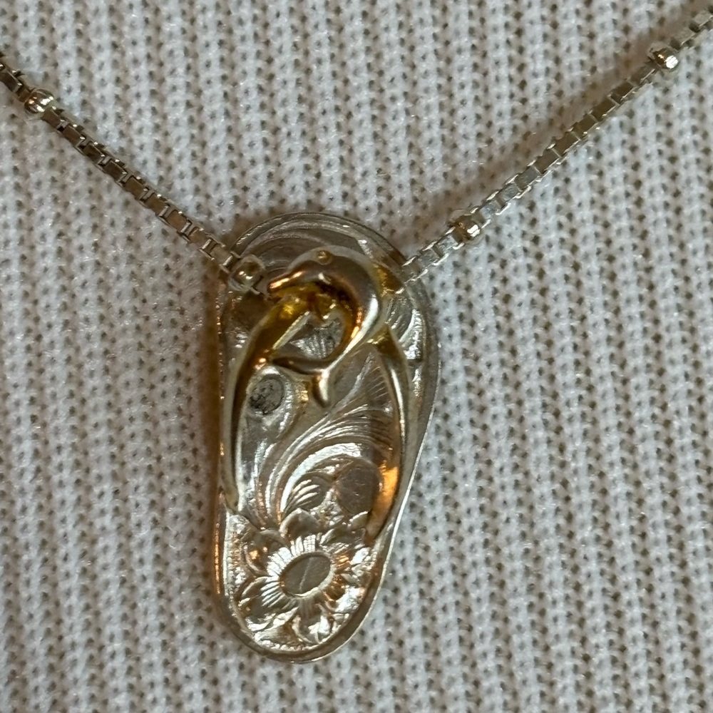 Elegant Gold and Silver Dolphin Pendant Necklace